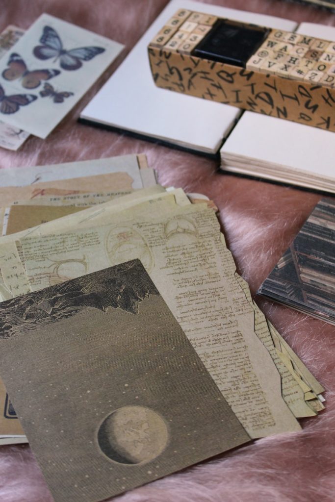 a table topped with lots of different types of papers